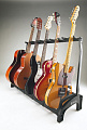 K&M 17515-016-55 Guardian 5 универсальная складная напольная стойка для пяти гитар, чёрные саппорты и держатели медиаторов